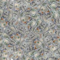 A close up of many different sized bills of various denominations, seamless pattern Concept of wealth and abundance photo