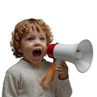 Cute 5 year old boy shouting on megaphone isolated on light blue background with copy space photo