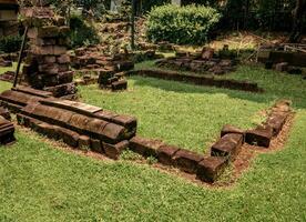 Ancient temple stones arranged to be restored to become a temple photo