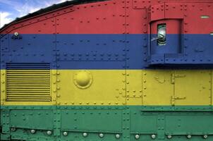 Mauritius flag depicted on side part of military armored tank closeup. Army forces conceptual background photo