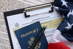 Department of State form DS11 Application for a U.S. Passport lies on table and ready to fill photo