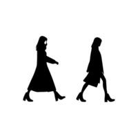 silhouettes of women standing and walking business people, black color isolated on white background vector