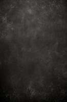 Textured blackboard surface with scratch marks, ideal for educational backgrounds, school-related designs. Realistic, black school board texture. Vertical format photo