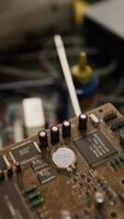 old computer floppy disk and motherboard video