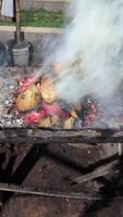 The process of making coals for grilled fish, made from old coconut shells photo