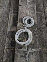 A series of cables that have not yet been installed, waiting for the poles to be erected photo