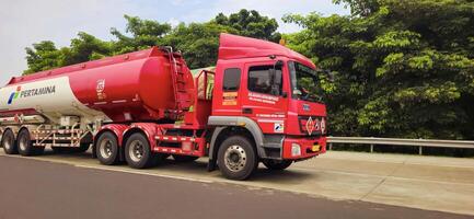 truck one of transportation mode making local commercial delivery at urban city and on the city streets in asia logistical transport system photo