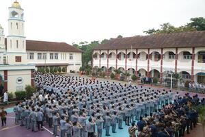 Subang, Indonesia - May 2024, Middle school, high school students and teachers taking part in a ceremony to commemorate National Education Day on the school field photo