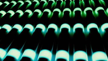 Abstract gradient light bulbs of long shape moving down on a black background, seamless loop. Design. Green and light blue lights in the dark. video