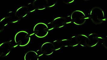Black background.Design.A green and gold chain consisting of circles in abstraction moves a little bit on a dark background. video