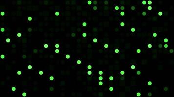 Black background with green blinking circles on a black background. Motion. Pixelated pattern with randomly blinking small circles, seamless loop. video