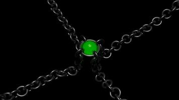 Black background. Design. An iron chain in 3d and a green circle like a stone in the middle in an abstraction that oscillates. video