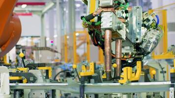 Robotic mechanism, industrial robot iin motion at the modern factory. Scene. Concept of heavy industry and machinery. video