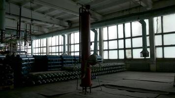 Equipment at the factory. Clip. A large room with huge bolons of gas that move and lie on top of each other. video