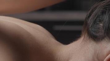 Relaxing massage with oils. Action. Massage for relaxation at spa. Gentle movements of masseur with oils for relaxation video