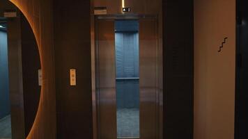 Office building .Stock footage.A beautiful floor of a new office with a large elevator and a large round mirror next to it. video