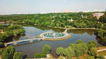 Top view of beautiful bridge with lake in palace park. Creative. Landscape of park and lake with bridge and island at palace. Museum-Reserve at Tsaritsyno Palace video