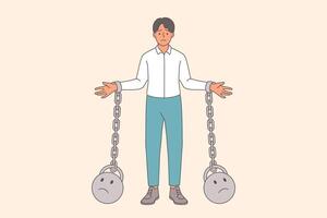 Business man slave suffers from lack of freedom, stands with weights tied in hands vector