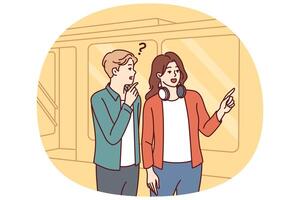 Man and woman tourists are standing near subway on tramway car, choosing shortest path vector