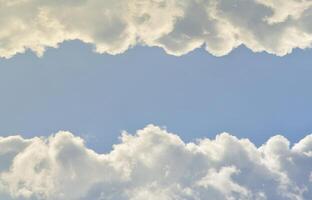 Blue sky with white clouds and horizontal text place photo