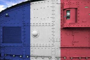 France flag depicted on side part of military armored tank closeup. Army forces conceptual background photo