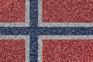 Norway flag depicted on many small shiny sequins. Colorful festival background for party photo