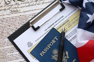 Department of State form DS11 Application for a U.S. Passport lies on table and ready to fill photo