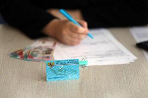 Indonesian national electric identity card called E-KTP or Kartu Tanda Penduduk photo