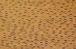 Dark brick wall pattern with chaotic masonry order. Background texture or resource for 3d texturing. Many bricks in big modern stone wall photo