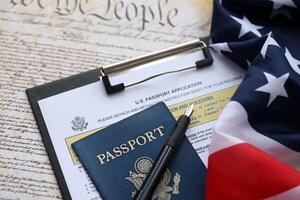 Department of State form DS11 Application for a U.S. Passport lies on table and ready to fill photo