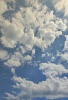 Beautiful blue sky background template with some space for input text message below isolated on blue photo