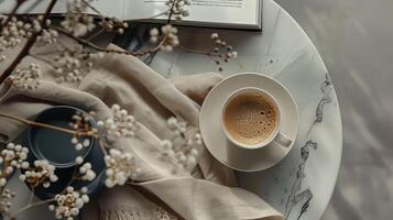 Neutral layout with a hot cup of coffee photo