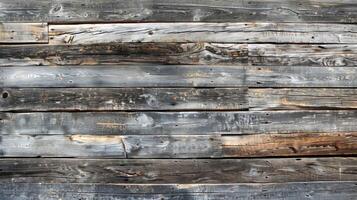A wooden surface with a lot of scratches and dents. The wood is old and worn photo