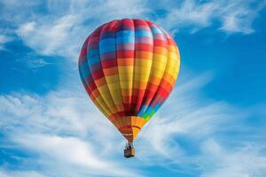 Rainbow-colored hot air balloon floating elegantly with a transparent sky photo