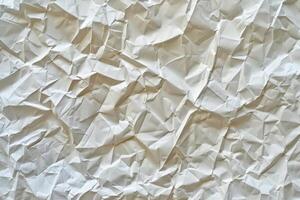 Seamless crumpled paper pattern with wrinkled and uneven surface photo