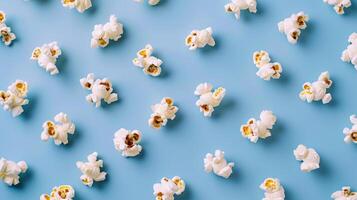 Minimalist layout of spinning popcorn kernels in a minimalist pattern photo