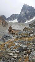 Remote mountain refuges providing shelter to adventurers photo