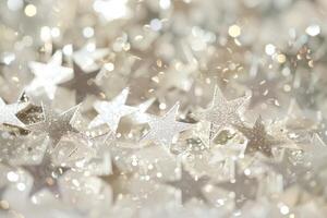 Glistening star-shaped sparkles twinkling against a transparent white backdrop, adding a touch of celestial beauty photo