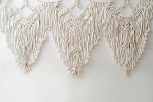 Boho chic macrame decor against a soft transparent white backdrop, ideal for bohemian designs photo