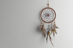 Boho chic dreamcatcher decoration on a transparent white background, adding mystical vibes photo