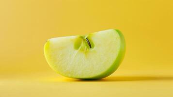 Clean and minimalistic spin of a green apple slice photo