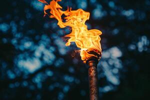 Bright torch flames illuminating the darkness against a transparent white surface, evoking images of adventure photo