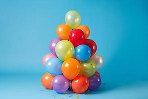 Cluster of balloons arranged in the shape of a birthday cake, ideal for birthday celebrations photo