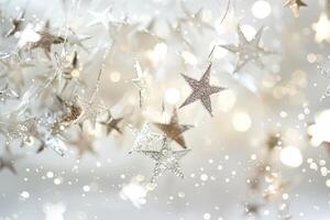 Sparkling star-shaped sparkles twinkling against a transparent white backdrop, adding a touch of celestial beauty photo