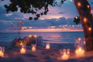Romantic dinner setup on a beach at twilight photo