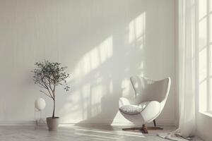 A white chair sits in front of a window with a potted plant in the foreground. The room is clean and uncluttered, with a neutral color scheme photo