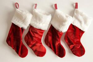 Traditional Christmas stockings on a transparent white canvas, ideal for holiday graphics photo