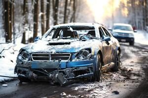 car accident in winter on slippery road with snow and ice photo
