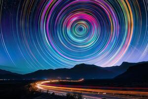 Rainbow-colored light trails transparently streaking across the night sky photo