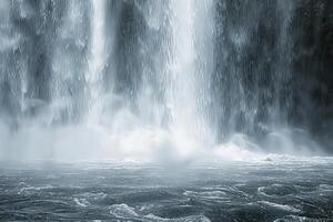 A majestic waterfall, with cascading water and misty spray photo